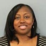 Headshot of a smiling Black woman.