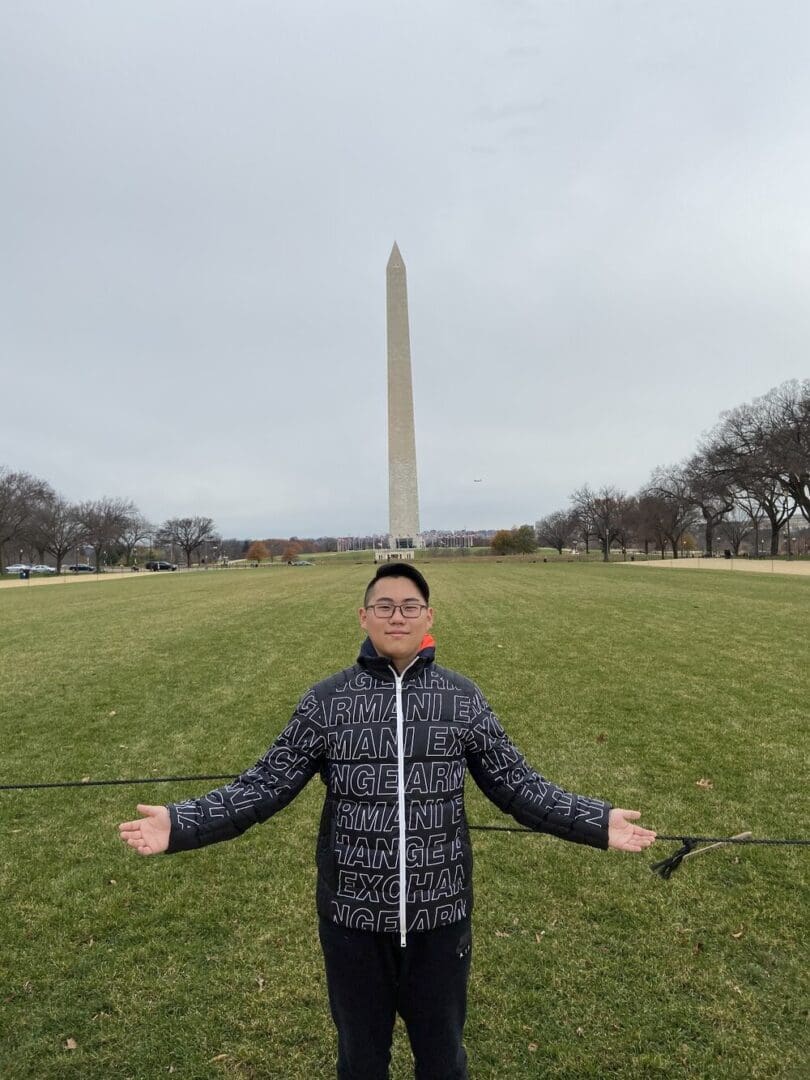 Man in front of Washington Monument.