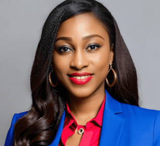 Headshot of a woman in a blue blazer.