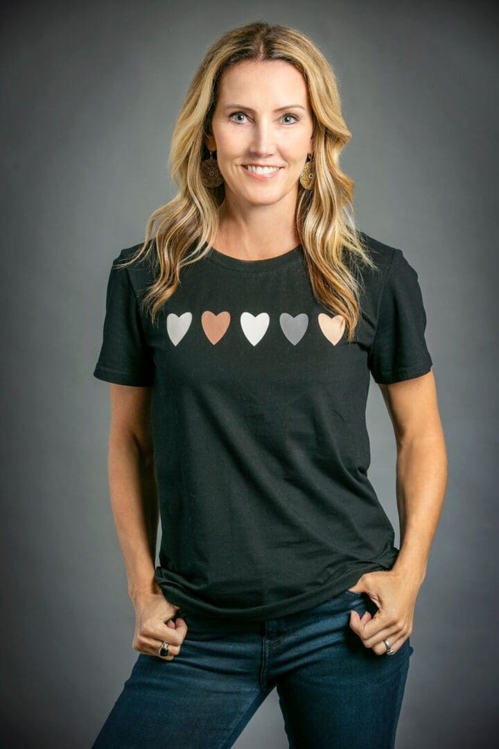 Woman in black t-shirt with hearts